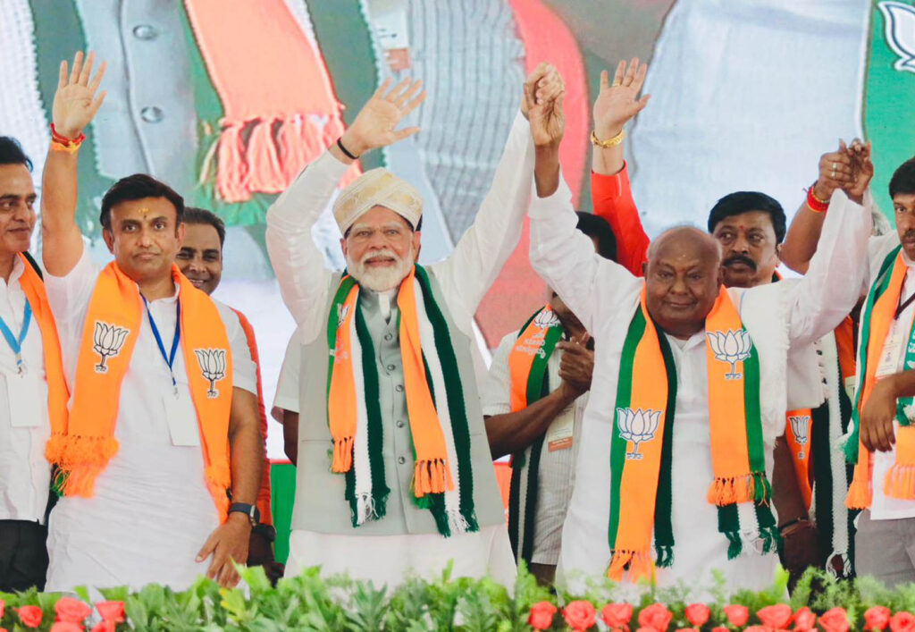 Addressing a BJP convention near Agalagurki in Chikkaballapur taluk today, Prime Minister Modi said support NDA candidates for a developed India.